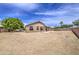 View of back of the home with large backyard at 863 S Del Rancho --, Mesa, AZ 85208