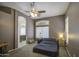 Bedroom features neutral walls, carpet, and view to the bathroom at 863 S Del Rancho --, Mesa, AZ 85208
