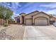 Attractive single-story home boasting a convenient two-car garage, neutral stucco, and desert landscaping at 863 S Del Rancho --, Mesa, AZ 85208
