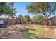 Backyard featuring a playset, artificial turf, and barbeque grill at 8724 N 28Th Ave, Phoenix, AZ 85051