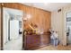 Room with tile floors, wood-paneled walls, and a dresser at 8724 N 28Th Ave, Phoenix, AZ 85051