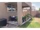 Comfortable back patio space featuring covered area, potted plants and seating, ideal for relaxing outdoors at 914 W Morelos St, Chandler, AZ 85225