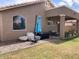 Spacious back yard featuring a covered patio, rock landscaping and ample space for entertaining at 914 W Morelos St, Chandler, AZ 85225