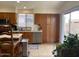 Bright kitchen with stainless steel appliances, wood cabinets, and outdoor view at 914 W Morelos St, Chandler, AZ 85225
