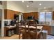 Well-lit kitchen with stainless steel appliances and wooden cabinets at 914 W Morelos St, Chandler, AZ 85225