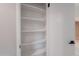 Bright closet featuring ample shelving for organized storage solutions at 10644 W Campana Dr, Sun City, AZ 85351