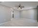Bright main bedroom offers an inviting atmosphere with light walls and wood-look floors at 10644 W Campana Dr, Sun City, AZ 85351