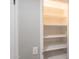 Bright storage closet with multiple shelves for optimal organization and storage at 10644 W Campana Dr, Sun City, AZ 85351