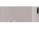 Close up of a textured light gray interior wall and door frame at 10644 W Campana Dr, Sun City, AZ 85351