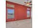 A bedroom with carpet and multiple windows for great natural light at 11547 W King Snake Ct, Surprise, AZ 85378
