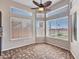 The eat-in dining area features tile floor and multiple windows at 11547 W King Snake Ct, Surprise, AZ 85378