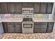 Close-up of the kitchen featuring stainless steel appliances and ample cabinet space at 11547 W King Snake Ct, Surprise, AZ 85378