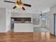 View of open kitchen with stainless steel appliances and eat-in breakfast area at 11547 W King Snake Ct, Surprise, AZ 85378