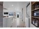 Bright, open-concept living space with kitchen, dining and laundry flowing seamlessly together at 13020 N 18Th St, Phoenix, AZ 85022