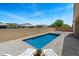 Private backyard pool with lounge chairs, perfect for relaxing and enjoying sunny days at 13612 W Desert Moon Way, Peoria, AZ 85383