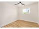 Light-filled bedroom with wood floors and a window providing outdoor views at 1368 W 14Th St, Tempe, AZ 85281