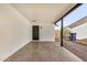 Spacious carport with a clean, painted brick wall and access to storage at 1368 W 14Th St, Tempe, AZ 85281