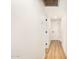 Hallway with light hardwood floors and white walls at 1368 W 14Th St, Tempe, AZ 85281