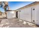 Enclosed patio with a large concrete pad and white painted exterior walls at 1368 W 14Th St, Tempe, AZ 85281