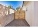 Gated side yard with gravel and a cinder block wall at 1368 W 14Th St, Tempe, AZ 85281