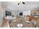 Open-concept living space seamlessly connects kitchen, dining, and living areas at 18391 W Stinson Dr, Surprise, AZ 85374