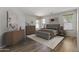 Serene main bedroom featuring wood floors and lots of natural light at 18391 W Stinson Dr, Surprise, AZ 85374