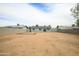 Large backyard with ample space provides an open canvas for landscaping and outdoor activities at 2018 W Western Dr, Chandler, AZ 85224