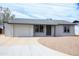 Charming single story home featuring a neutral color palette, new roof, and low maintenance front yard at 2018 W Western Dr, Chandler, AZ 85224