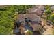 Aerial view of the property featuring a spacious backyard and mature trees at 20638 W Main St, Buckeye, AZ 85396