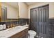 Nicely decorated powder room features elegant fixtures and a modern design for a luxurious experience at 20638 W Main St, Buckeye, AZ 85396
