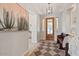 Welcoming foyer with stylish decor, wood flooring, and ample natural light at 20638 W Main St, Buckeye, AZ 85396