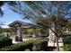 A shaded pavilion with stone columns in a grassy park-like setting, perfect for relaxation at 20638 W Main St, Buckeye, AZ 85396