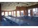 Covered outdoor picnic area featuring multiple picnic tables and open views of the community at 20638 W Main St, Buckeye, AZ 85396
