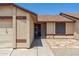 Close-up of the facade of a single-story home showing the front door and address at 20644 N 30Th Dr, Phoenix, AZ 85027