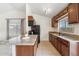 A kitchen featuring granite countertops, wood cabinetry and stainless steel appliances at 20644 N 30Th Dr, Phoenix, AZ 85027