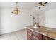 Kitchen and living area boasting granite countertops and stainless-steel appliances at 20644 N 30Th Dr, Phoenix, AZ 85027