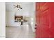 Inviting open-concept living space featuring tile flooring that flows into the kitchen area at 20644 N 30Th Dr, Phoenix, AZ 85027