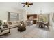 Bright and airy living room and dining area with neutral decor and modern lighting at 20644 N 30Th Dr, Phoenix, AZ 85027
