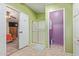 Bright bathroom with a tiled floor, standing shower, and view into the bedroom at 215 N Power Rd # 33, Mesa, AZ 85205