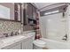 Bathroom with vanity, granite countertop, and a shower with a tub at 215 N Power Rd # 33, Mesa, AZ 85205