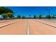 An outdoor bocce ball court in a community with multiple lanes ready for play at 215 N Power Rd # 33, Mesa, AZ 85205