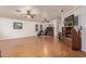 Spacious living room with hardwood floors, ceiling fans and a desk area at 215 N Power Rd # 33, Mesa, AZ 85205