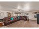 Inviting living room featuring a large sectional sofa, carpeted floors and recessed lighting at 215 N Power Rd # 33, Mesa, AZ 85205