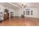 Bright, open-concept living room with hardwood floors, high ceilings, and abundant natural light at 215 N Power Rd # 33, Mesa, AZ 85205