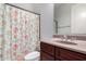 A bathroom features a granite-topped vanity and a shower/tub combo at 2308 E Aster Dr, Chandler, AZ 85286
