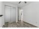 This bedroom has a sliding-door closet, view of the landing, and access to another room at 2308 E Aster Dr, Chandler, AZ 85286