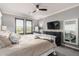 Bright bedroom with natural light, a comfortable bed, dresser and mirror at 2425 W Bronco Butte Trl # 2028, Phoenix, AZ 85085
