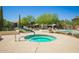 Inviting community hot tub with ample seating and desert landscaping at 2425 W Bronco Butte Trl # 2028, Phoenix, AZ 85085