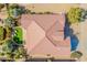 An aerial rooftop view of a home with patio, desert landscaping, and artificial grass at 2599 E San Mateo Dr, Casa Grande, AZ 85194