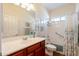 Bright bathroom with a single sink vanity, a shower/tub combo, and natural light at 2599 E San Mateo Dr, Casa Grande, AZ 85194